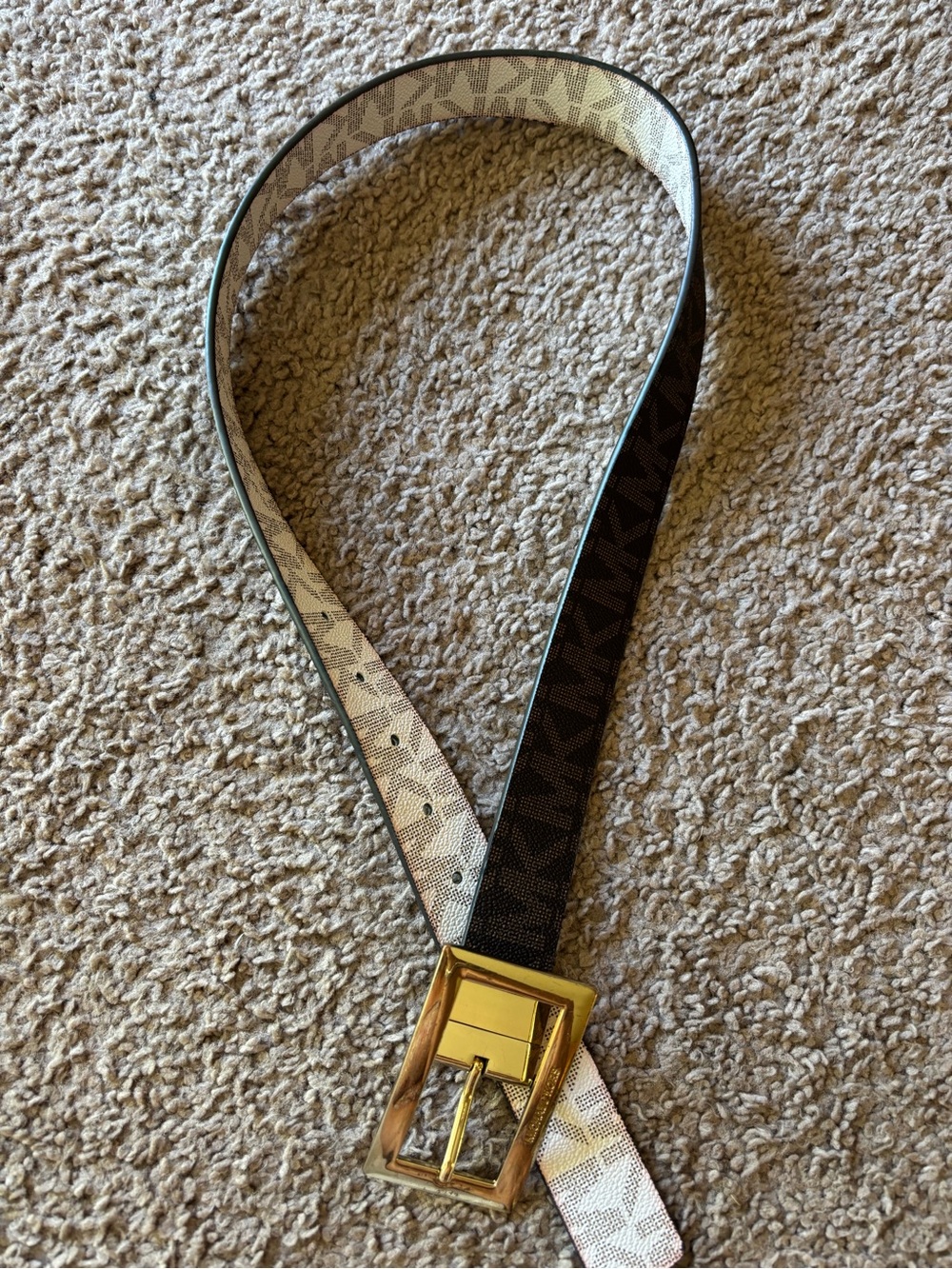 Michael Kors women's twist-reversible logo belt with a gold-tone buckle